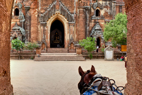 Horse cart approaching temple in Bagan