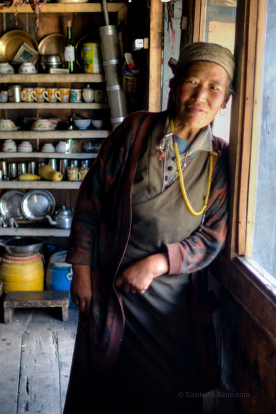Tibetan guesthouse owner in Upper Pisang