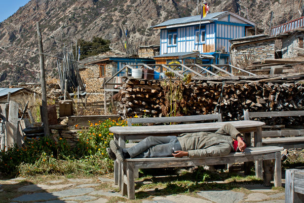Tibetan guesthouse owner in Ghyaru, Nepal