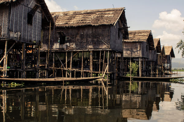 stilt houses floating on Inle Lake in Myanmar