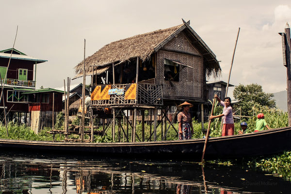 A large family boat on Inle Lake in Myanmar