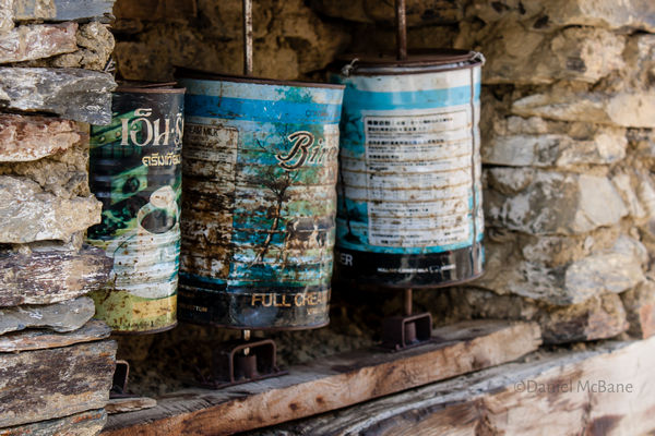 paint can prayer wheels in Ngawal, Nepal