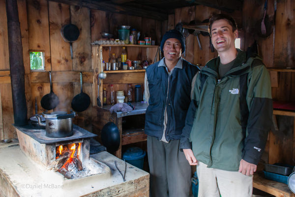 Guesthouse owner in kitchen in Ngawal, Nepal